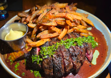 The Ravenous Pig signature dishes Steak Frites
Pub Burger
Pork Porterhouse